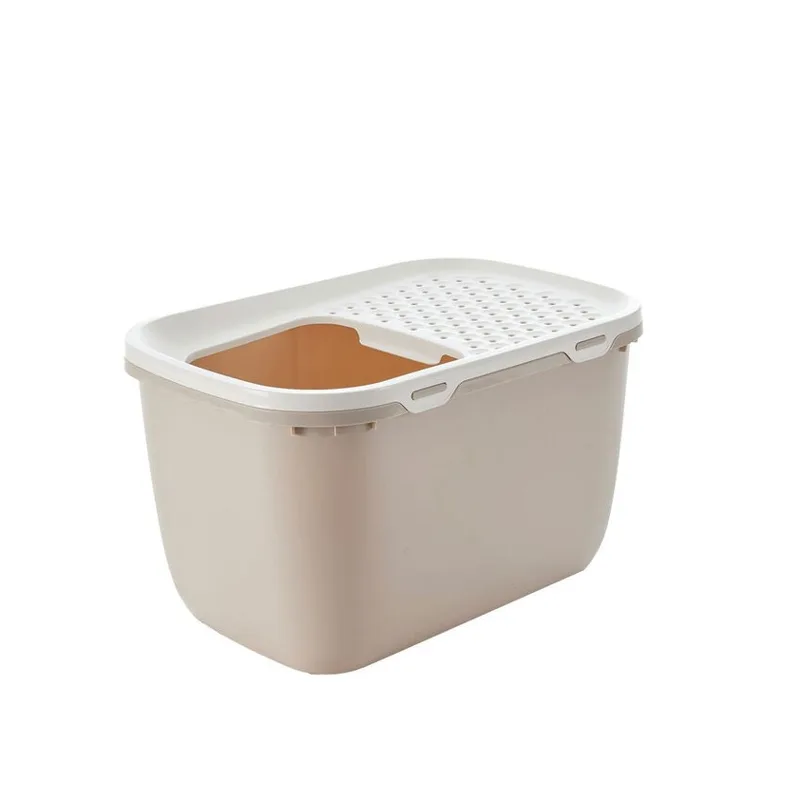 Beige päältä kuljettava kissanvessa, kannessa reikiä