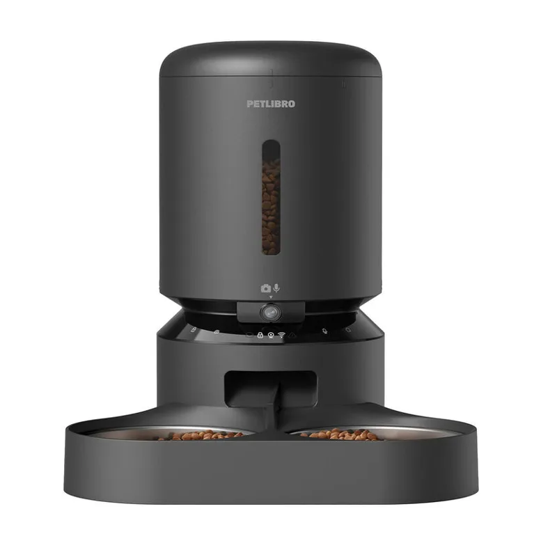 Musta ruoka-automaatti kahdella ruokakupilla